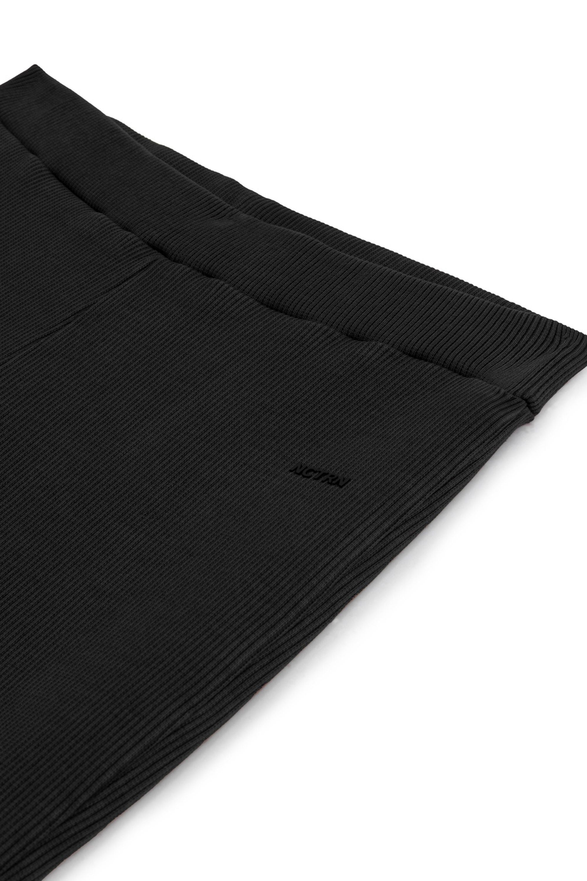 Black Ribbed Flared Trousers