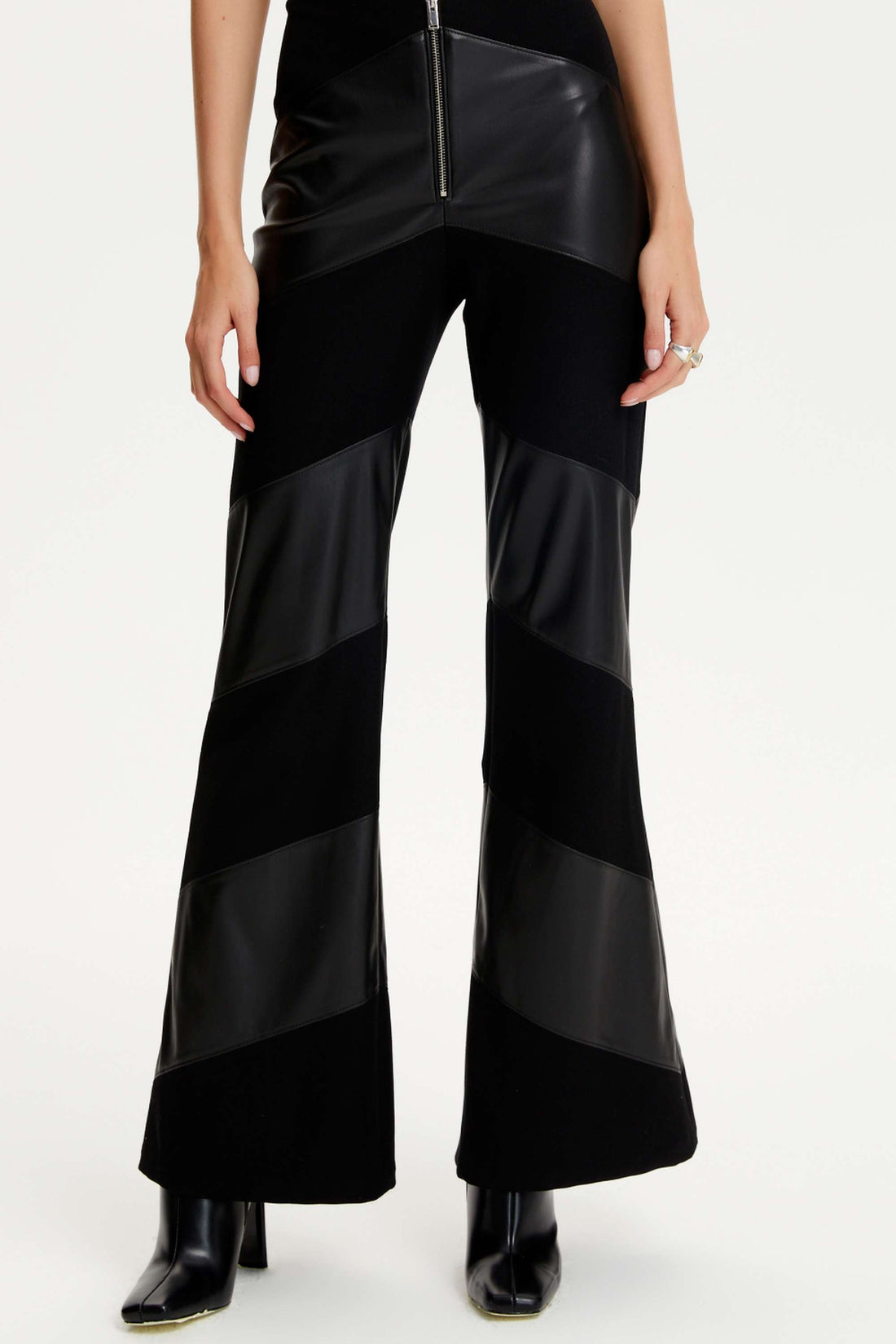 Black High-Waisted Flare Pants by NOCTURNE